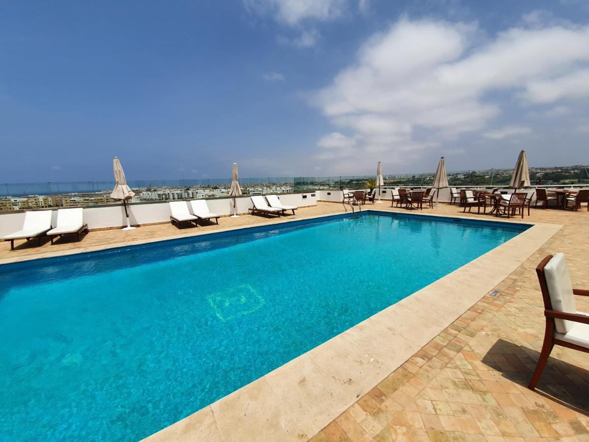 Hotel Borj Rabat - A Member Of Barcelo Hotel Group Exterior photo Rooftop pool at the hotel